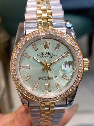 Rolex Datejust 31mm Baguette Diamond Bezel Two-tone Gold Band Mint Green Face Lady Watch